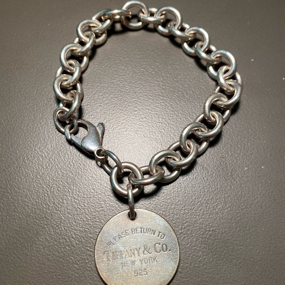 Tiffany & Co. round link bracelet with charm